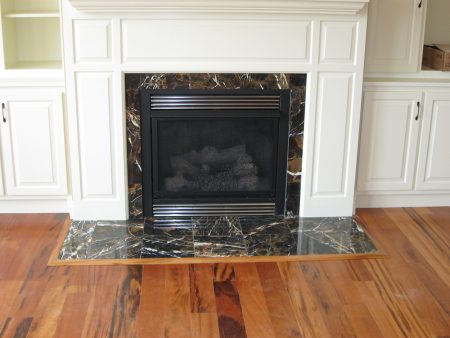 Tigerwood Floor with Italian Marble Fireplace