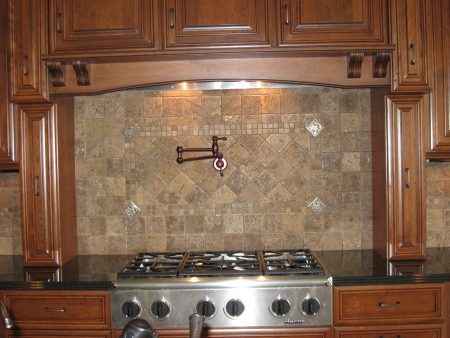 Tumbled Travertine with Mosiacs and Metal Accents