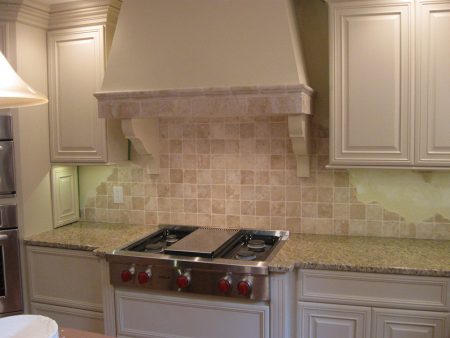 Custom Designed Marble Backsplash and Hood